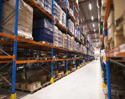 interior-large-distribution-warehouse-with-shelves-stacked-with-palettes-goods-ready-market